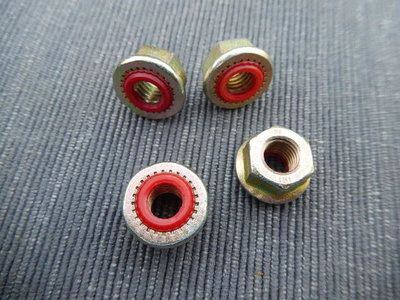 in der Hydraulik verwendete Muttern, die auch das Gewinde gegen Öl dichten.